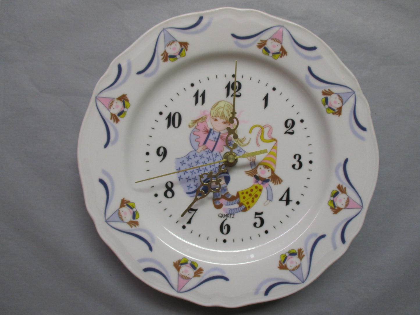 Pendule en Porcelaine Décor Enfant